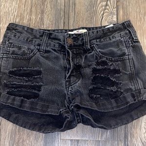 Hollister blacked ripped jean shorts.